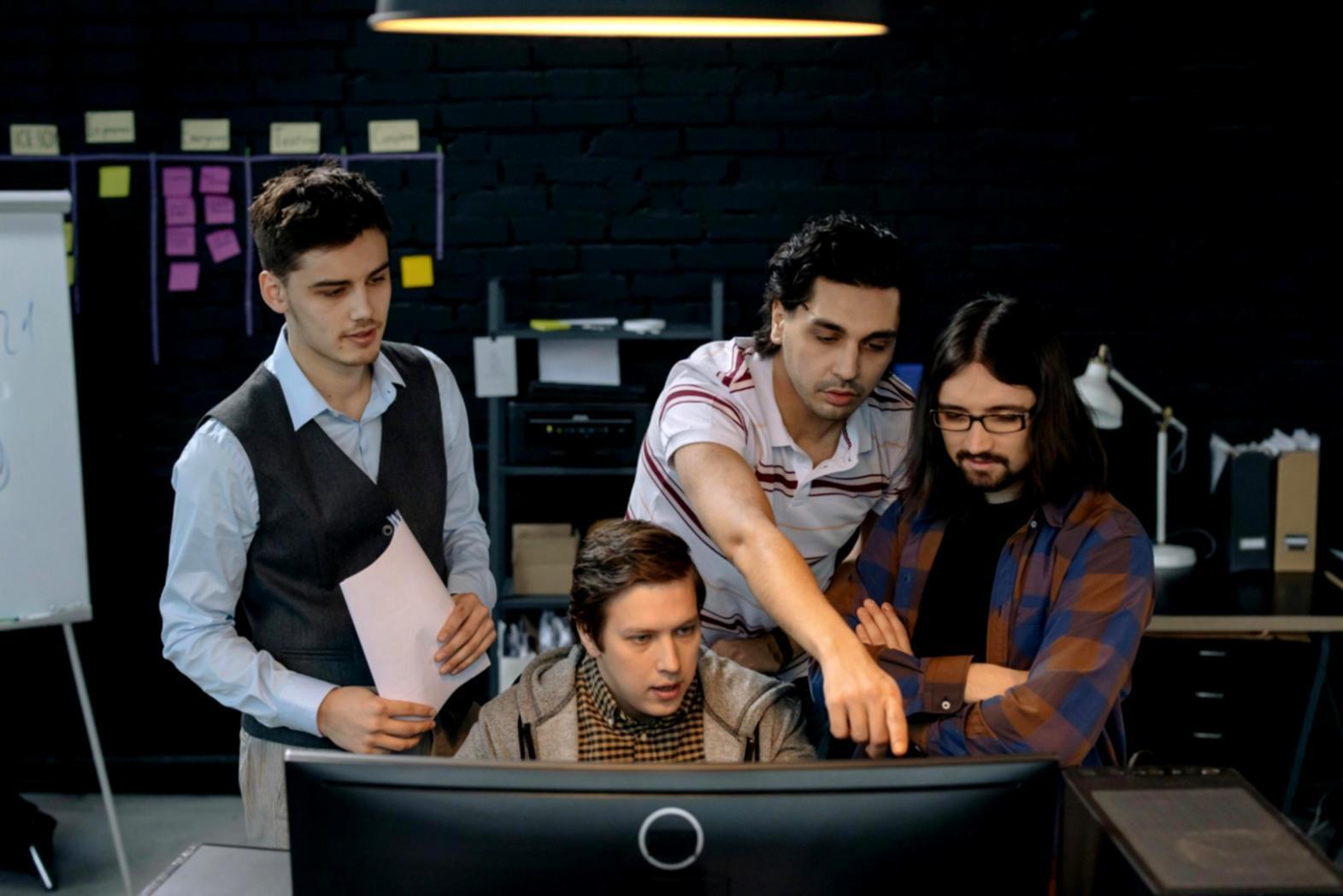 Business team collaborating on CRM implementation strategy with data visualization tools